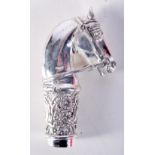 A CONTINENTAL SILVER CANE HANDLE IN THE FORM OF A HORSES HEAD. Stamped 800, 8.7cm x 4.8cm, weight 6