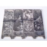 FOUR CHINESE WHITE METAL SCROLL WEIGHTS DECORATED WITH VARIOUS SCENES. 14.7cm x 4.5cm, total weight