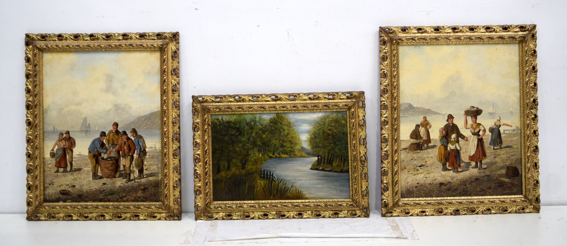 A pair of framed Oils on board depicting fisherman on a beach signed Robin together with a small oi