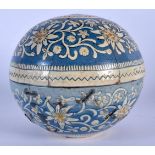 AN UNUSUAL MIDDLE EASTERN ENAMELLED TERRACOTTA BOWL AND COVER decorated with floral sprays. 12 diame