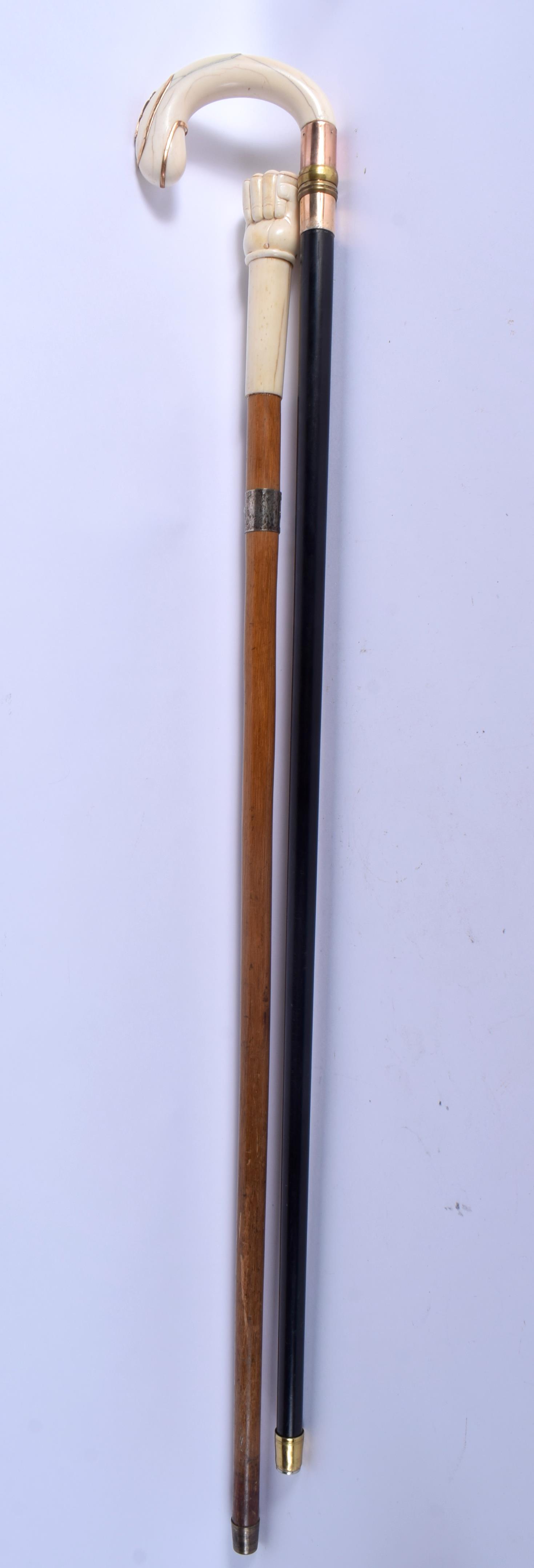 A VICTORIAN GOLD OVERLAID IVORY WALKING CANE together with a carved bone handled cane. Largest 84 cm - Image 5 of 5