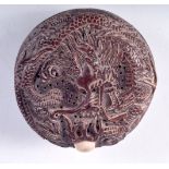 A JAPANESE WOODEN BOX CARVED WITH A DRAGON CHASING A FLAMING PEARL. 7cm x 3.5cm, weight 66.5g