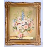 A large framed still life Oil on board by Arthur Fidler of flowers 56 x 43 cm.