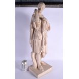 A LARGE 19TH CENTURY EUROPEAN GRAND TOUR TERRACOTTA FIGURE modelled clutching her robes. 74 cm high.