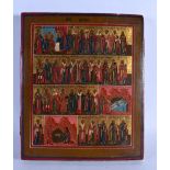 AN ANTIQUE PAINTED RUSSIAN WOOD ICON. 30 cm x 27 cm.