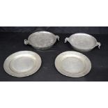 A pair of antique pewter warming plates. 23cm (4).