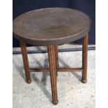 A small Islamic embossed table with wooden legs 60 x 60 cm.