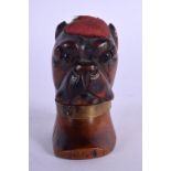 AN ANTIQUE BLACK FOREST BAVARIAN DOG PIN CUSHION. 7 cm x 3 cm.