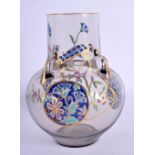 AN AESTHETIC MOVEMENT ENAMELLED GLASS VASE painted with flowers. 17 cm x 9 cm.