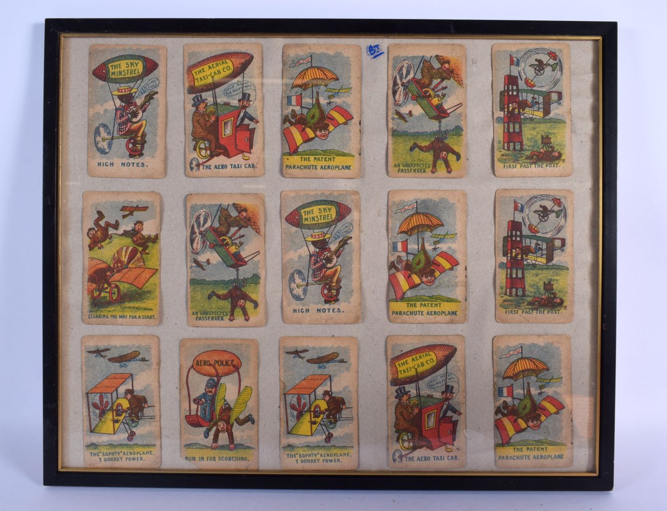 A FRAMED COLLECTION OF VINTAGE NOVELTY HUMEROUS CARDS. 42 cm x 34 cm.