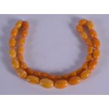 AMBER NECKLACE. Length 48cm, largest bead 11.9mm, weight 21.6g