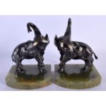 A PAIR OF ART DECO AUSTRIAN COLD PAINTED BRONZE ELEPHANT BOOKENDS formed as elephants. 19cm x 10cm