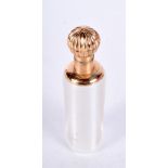 A GOLD TOPPED SCENT BOTTLE. 9.5cm x 2.5cm, weight 33.2g