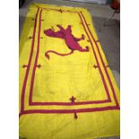 A large standard with a Lion Rampant central to the design, made by R.G.Neill and Sons. 360 x 170cm.