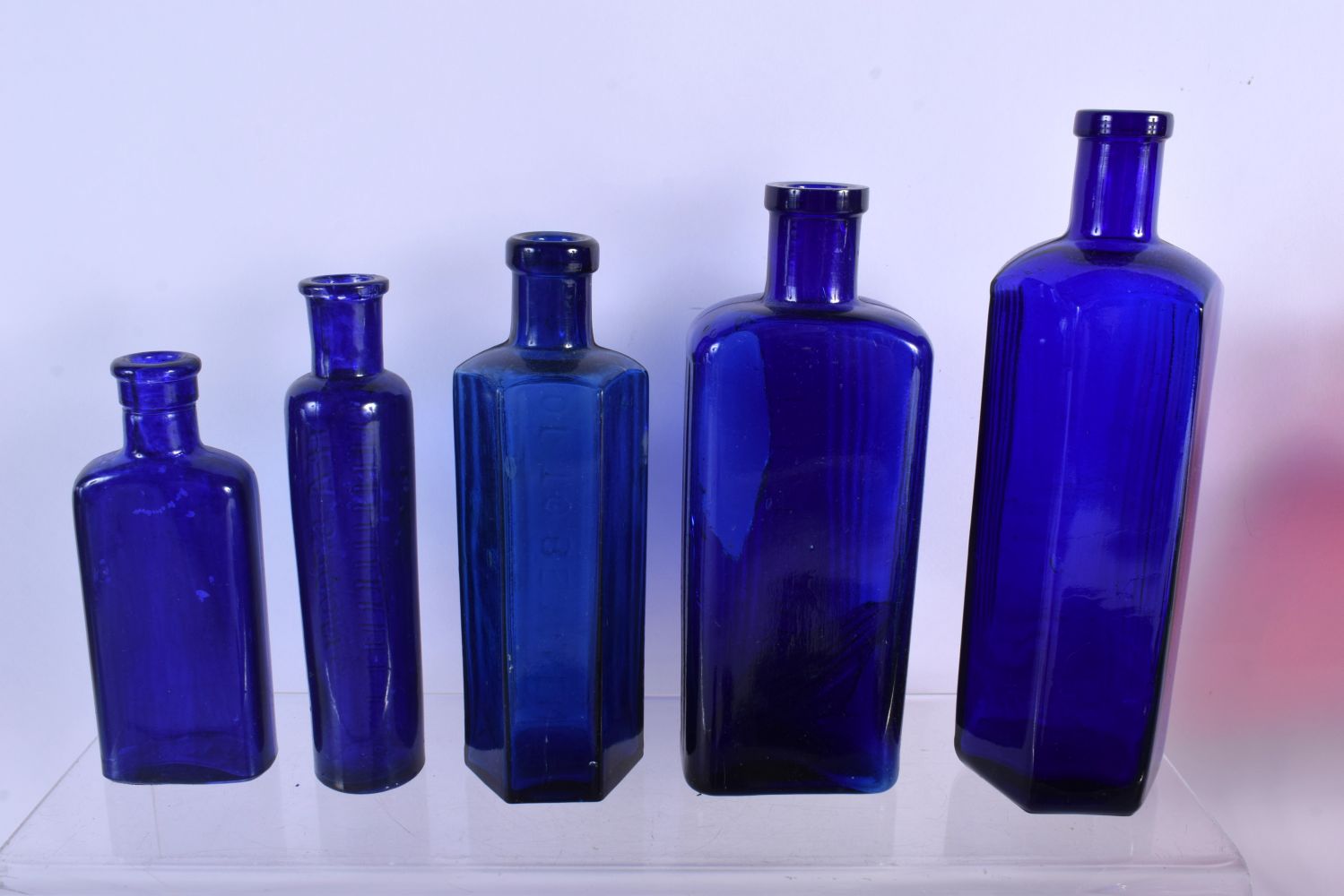 A COLLECTION OF VINTAGE GLASS POISON BOTTLES in various forms and sizes. (qty) - Image 3 of 11