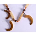 VINTAGE RHINO HORN NECKLACE. 63cm long, weight 43g