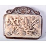 A JAPANESE WOOD AND BONE PENDANT CARVED WITH BIRDS IN A TREE. 5.2cm x 6.2cm x 1.3cm, weight 32.7g