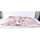 A patchwork quilt made from silk Japanese Kimonos