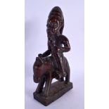 AN AFRICAN TRIBAL YORUBA EQUESTRIAN FIGURE. 22 cm x 8 cm.