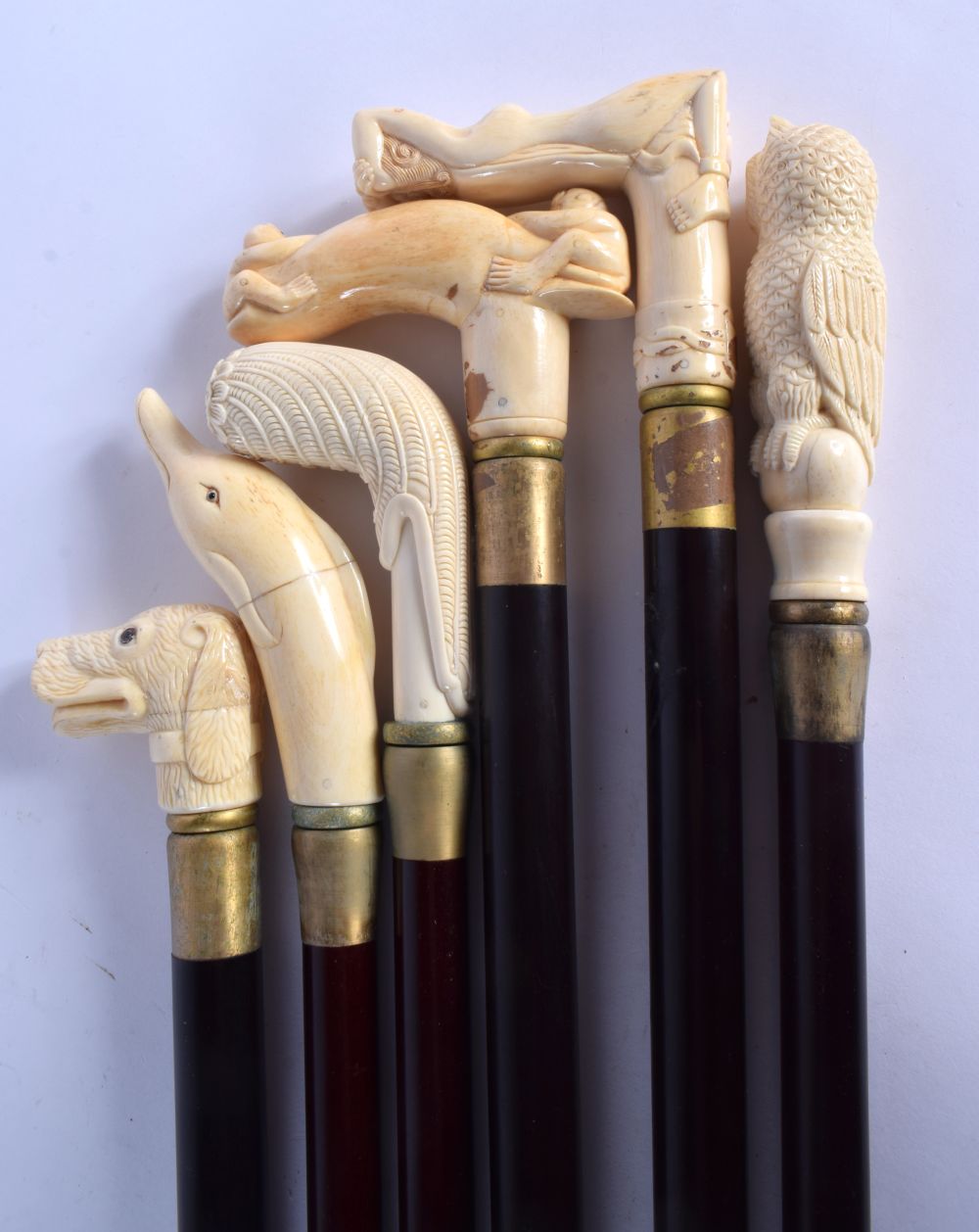 A SET OF SIX CONTINENTAL CARVED NOVELTY BONE WALKING CANES. 90 cm long. (6) - Image 2 of 3