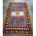 A large yellow ground Persian rug 260 x 163 cm