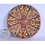 A 19TH CENTURY SPANISH HISPANO MORESQUE TIN GLAZED CHARGER painted with motifs. 40 cm diameter.