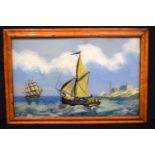 A framed reverse painted glass picture of sailing boats 35 x 56 cm.