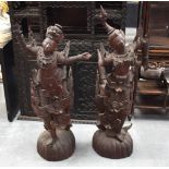 A LARGE PAIR OF 19TH CENTURY SOUTH EAST ASIAN CARVED WOOD BUDDHAS. 120 cm x 35 cm.