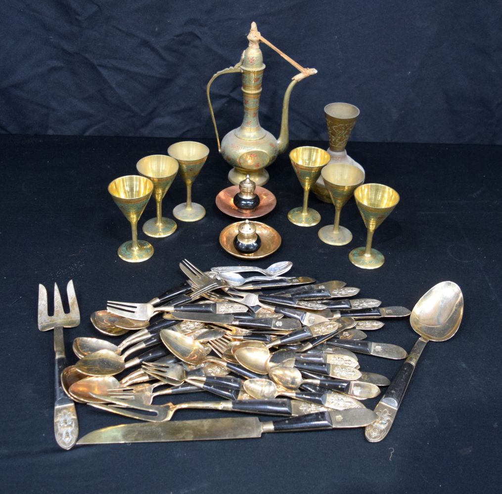 A collection of Thai bronze table ware together with a Turkish brass Ewer and drinking vessels.