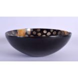 A FAUX TORTOISESHELL BOWL WITH A LIBERTY LABEL. 18cm diameter x 5cm