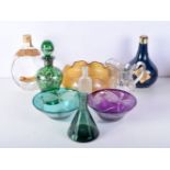 A collection of glass including a Georgian jug antique bottles together with other glass items va