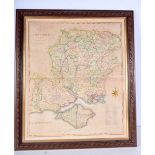 A framed map on parchment of Hampshire dated 1805 by Robert Morden 54 x 45 cm.