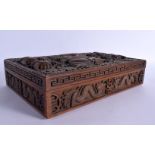 A LATE 19TH CENTURY BURMESE ASIAN CARVED WOOD BOX decorated with dragons. 30 cm x 22 cm.