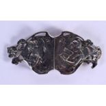 AN ANTIQUE WHITE METAL BELT BUCKLE DECORATED WITH YOUNG LADIES. 10.5cm x 4.7cm, weight 42g