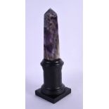 AN AMETHYST OBELISK. 22 cm high.