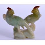 A LATE 19TH CENTURY CHINESE CARVED TRI COLOUR JADEITE FIGURE modelled as birds. 7 cm x 6 cm.