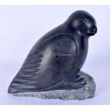 AN UNUSUAL NORTH AMERICAN INUIT CARVED STONE FIGURE OF A BIRD. 15 cm x 12 cm.