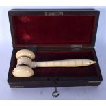 A CASED EARLY VICTORIAN IVORY GAVEL Corn Exchange Committee 1853, within a fitted rosewood case. 16.