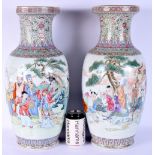 A LARGE PAIR OF CHINESE REPUBLICAN PERIOD FAMILLE ROSE VASES painted with figures and foliage. 44 cm