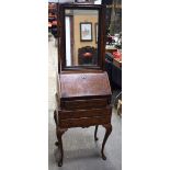 AN 18TH CENTURY BURR WALNUT BUREAU TOP MIRROR upon a later 1920s walnut base. 168 cm x 50 cm.