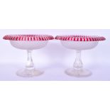 A PAIR OF 1930S BOHEMIAN RUBY FLASH CLEAR GLASS COMPORTS. 18 cm x 16 cm.