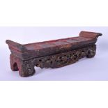 AN UNUSUA 17TH/18TH CENTURY INDIAN CARVED WOOD POLYCHROME STAND formed as an opium type table. 27 cm