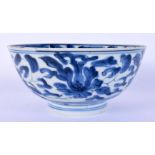 A 17TH/18TH CENTURY CHINESE BLUE AND WHITE PORCELAIN BOWL Kangxi/Yongzheng, painted with flowers. 14