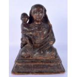 A RARE 17TH/18TH CENTURY INDO PORTUGUESE GOA INDAN CARVED WOOD FIGURE OF A SAINT modelled with an at