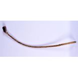 AN UNUSUAL 18TH/19TH CENTURY CONTINENTAL CARVED WOOD WHIP of spiralised form. 60 cm long.