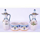 A PAIR OF FRENCH TIN GLAZED FAIENCE JUGS AND COVERS together with a similar double salt. Largest 12.