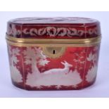 A FINE 19TH CENTURY BOHEMIAN CRANBERRY GLASS CASKET engraved with deer within landscapes. 14 cm x 9