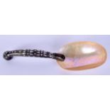 A RARE 19TH CENTURY INDIAN CARVED RHINOCEROS HORN AND MOTHER OF PEARL SPOON Goa, inlaid with motifs.