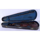 A CASED GERMAN VIOLIN with bow. 58 cm long.