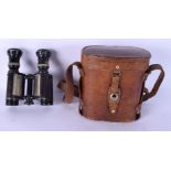 A LOVELY PAIR OF MILITARY RANGE FINDER BINOCULARS inset with plaques of horses. 12 cm x 10 cm.